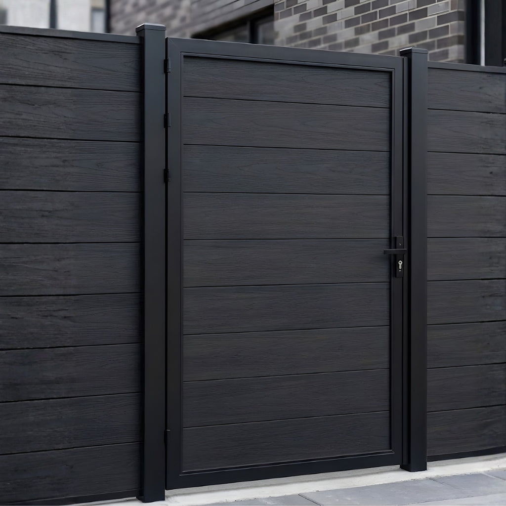 Black WPC fence single gate installed in a matching horizontal privacy fence