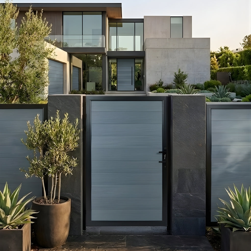 Gray WPC fence single gate installed in a modern front fence with potted plants