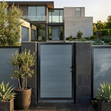 Gray WPC fence single gate installed in a modern front fence with potted plants